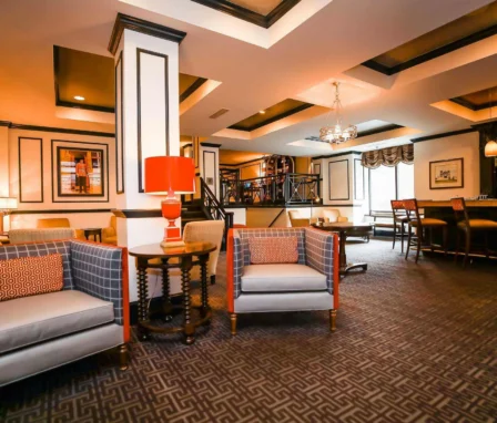 Elegant hotel lounge with cosy seating and a welcoming atmosphere.