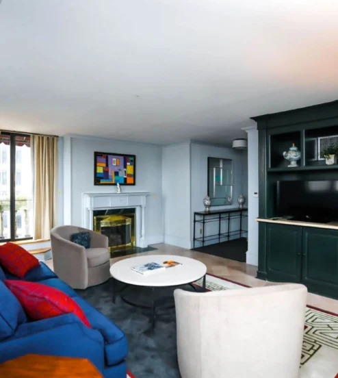 Elegant hotel lounge with plush seating and modern decor, ideal for relaxation.