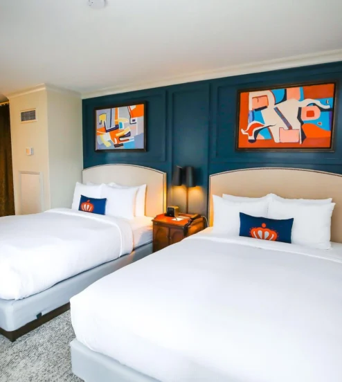 Cosy twin room with modern decor at a boutique hotel.